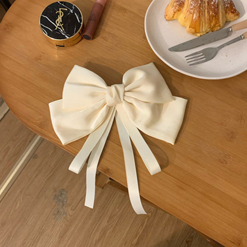 Big bow streamer hair clip