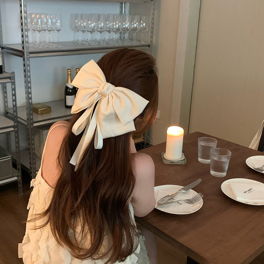 Big bow streamer hair clip